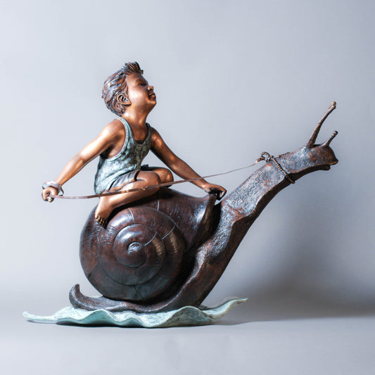 Little Boy Riding A Snail Bronze Fountain