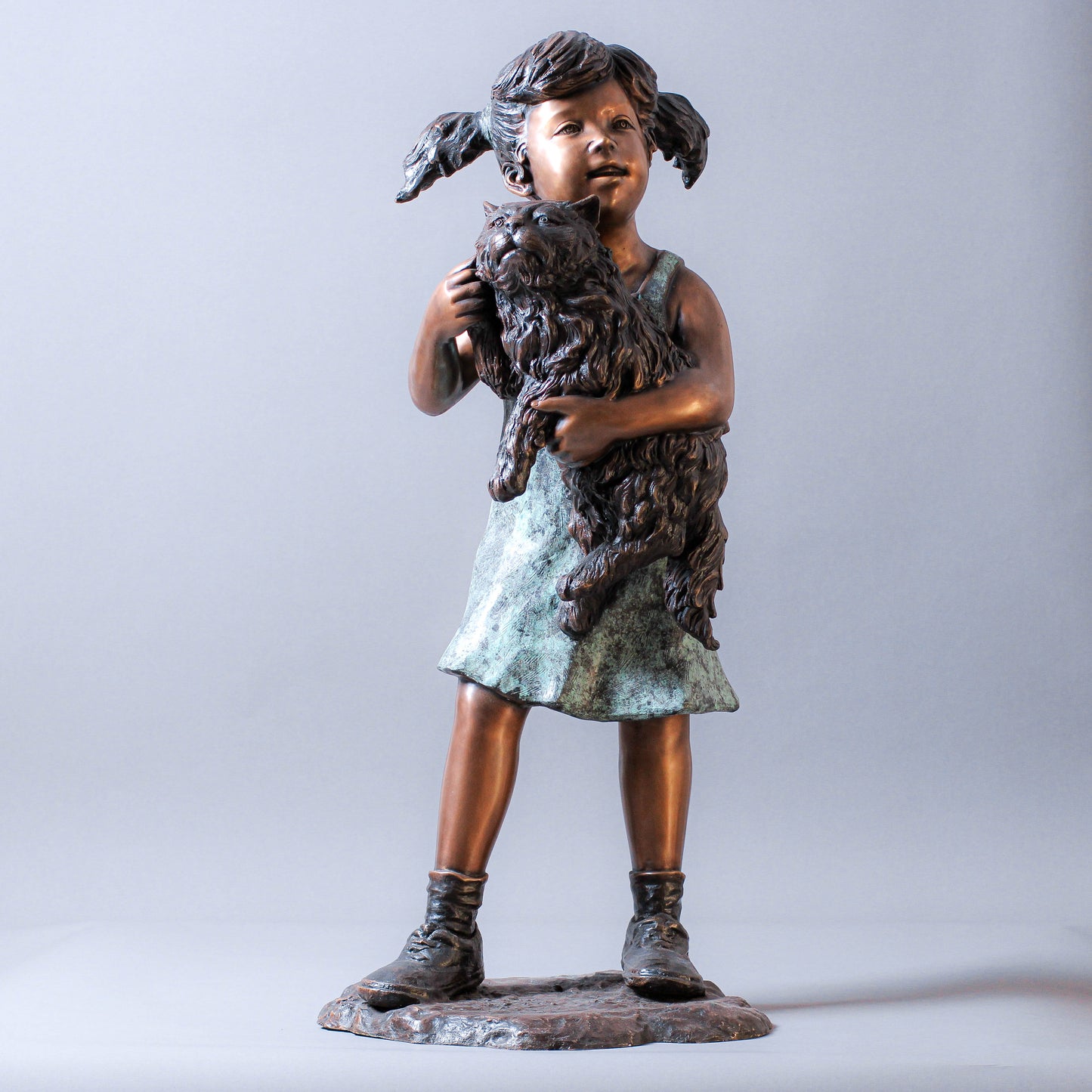 Little Girl Holding A Cat Bronze Sculpture