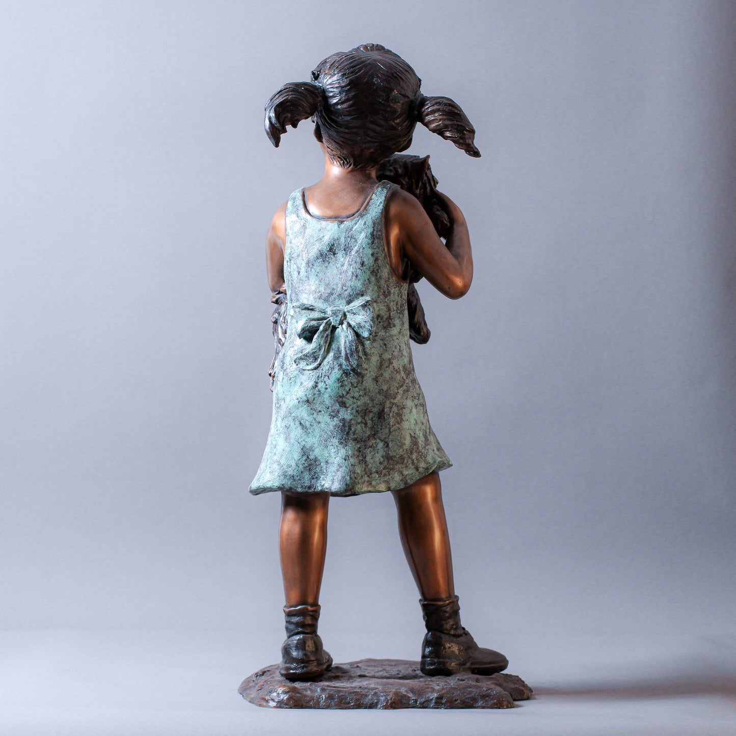 Little Girl Holding A Cat Bronze Sculpture