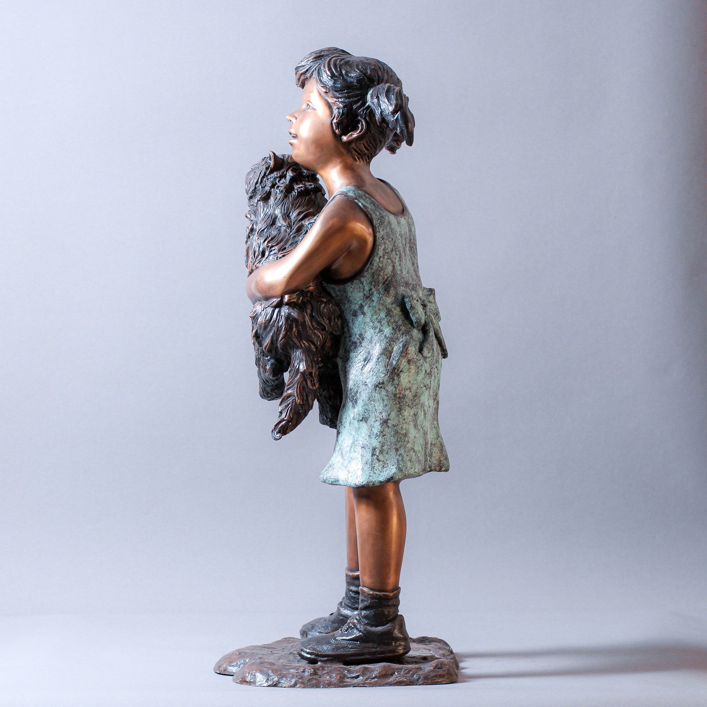 Little Girl Holding A Cat Bronze Sculpture