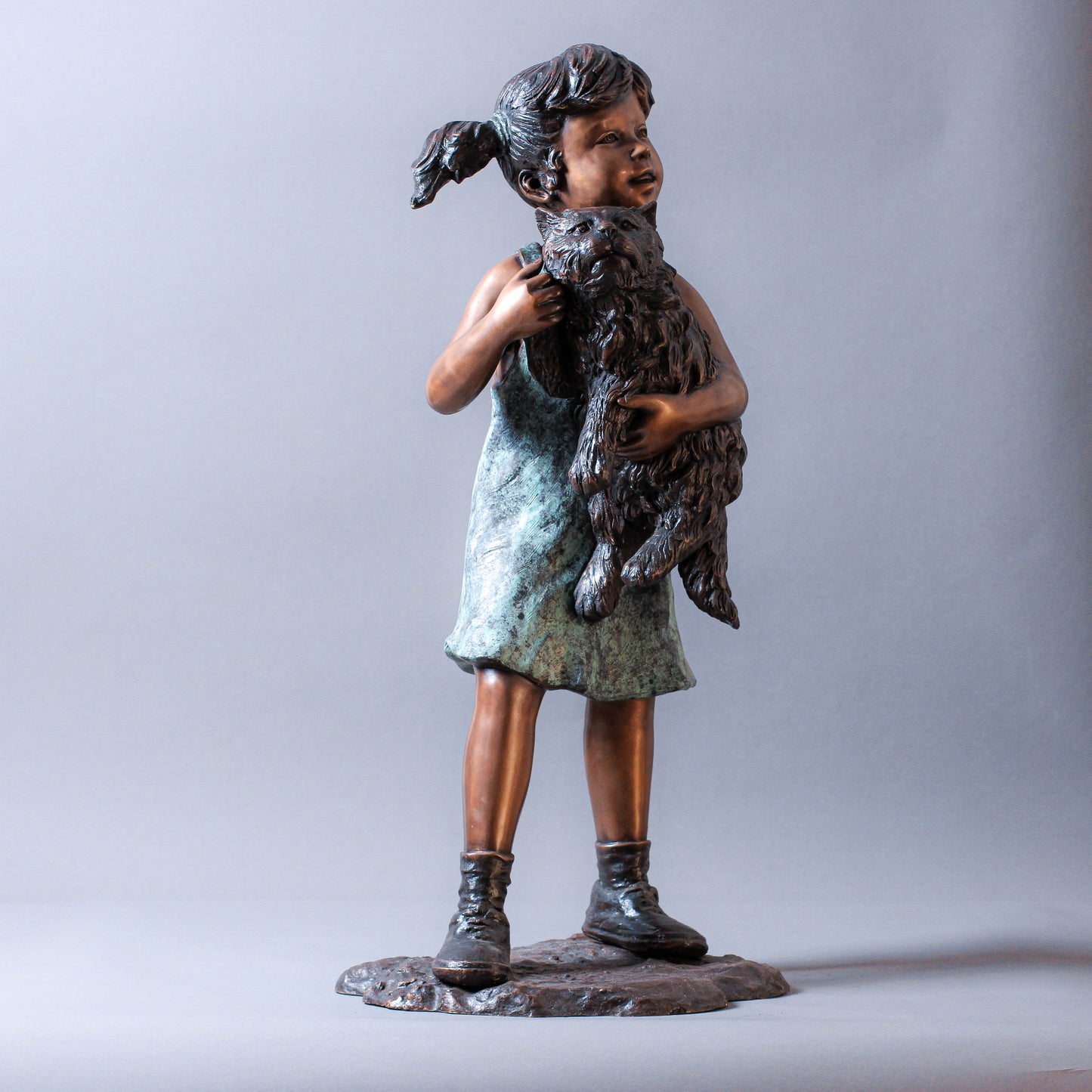 Little Girl Holding A Cat Bronze Sculpture