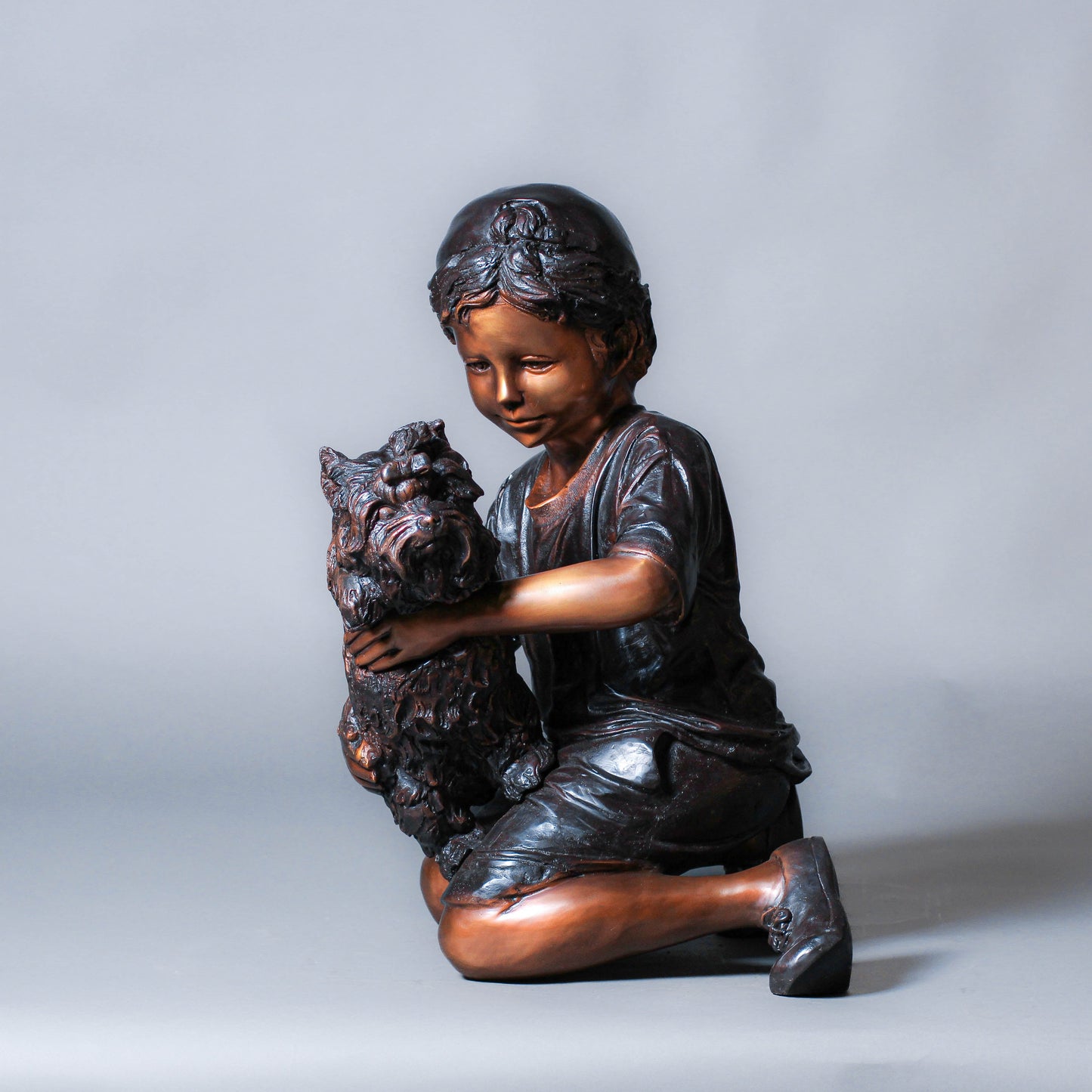 Boy Playing with a Dog Bronze Sculpture