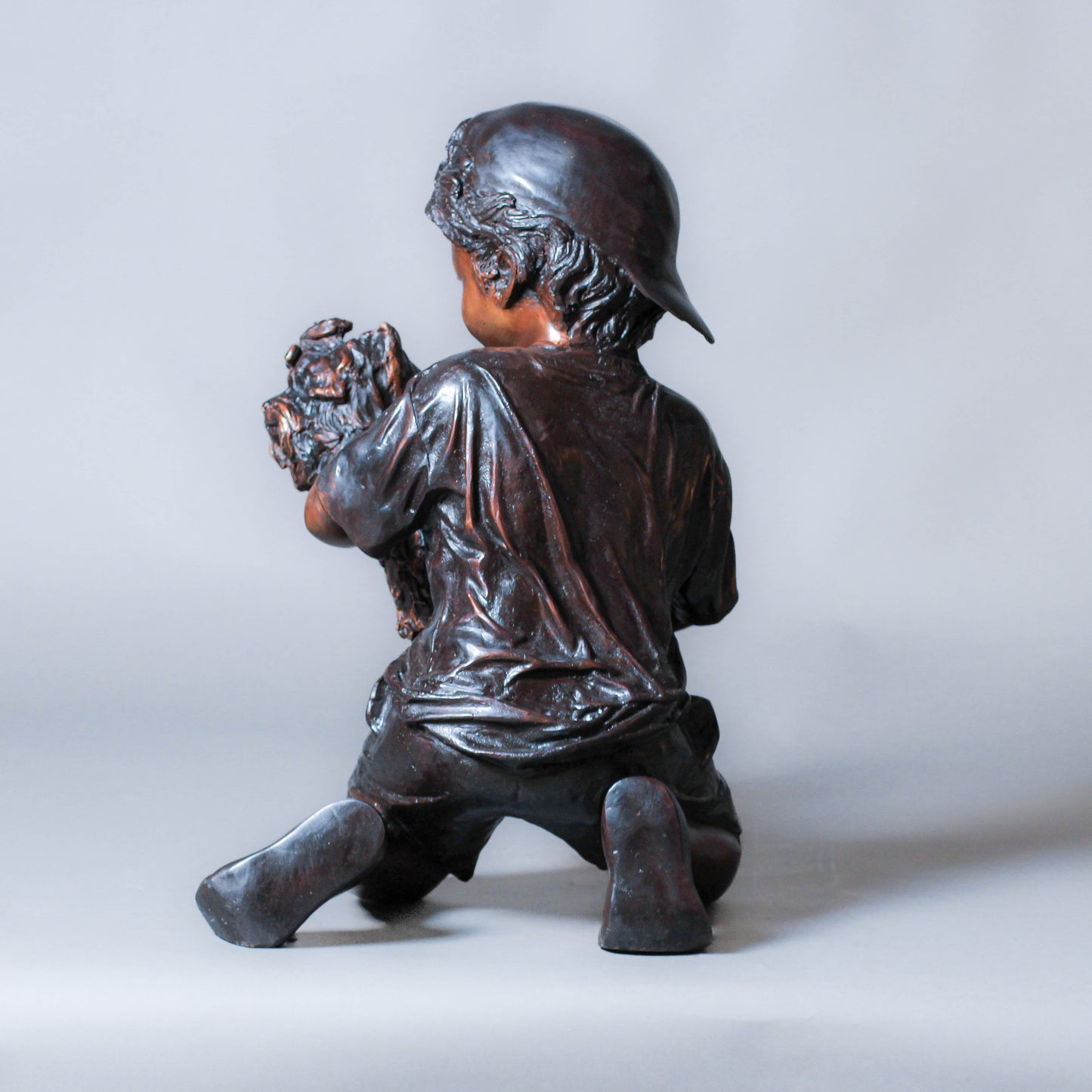 Boy Playing with a Dog Bronze Sculpture